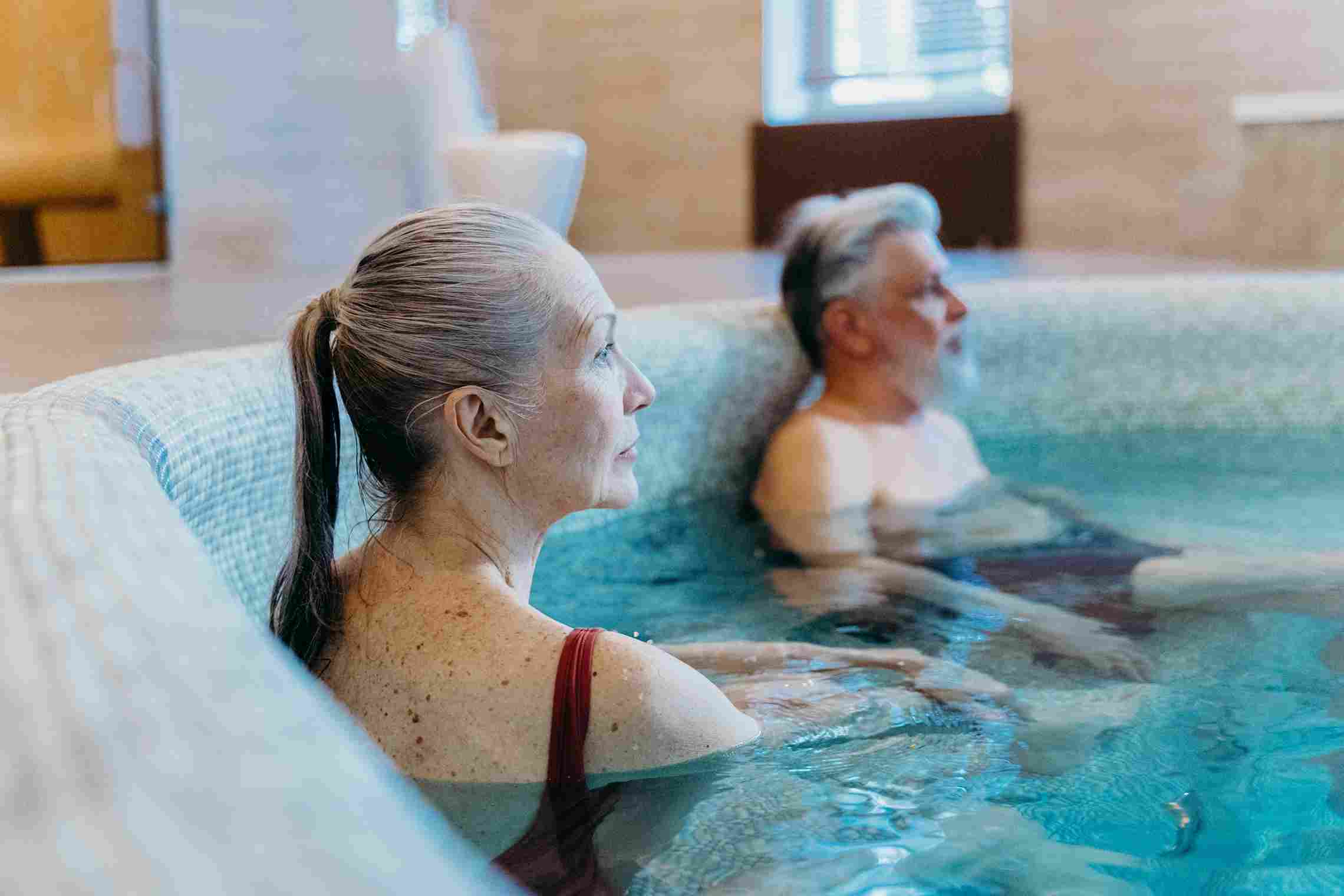Elderly people in a pool.