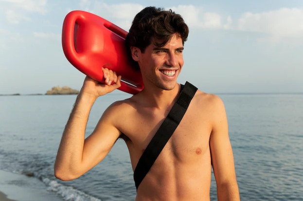 Medium shot smiley man holding lifesaving buoy
